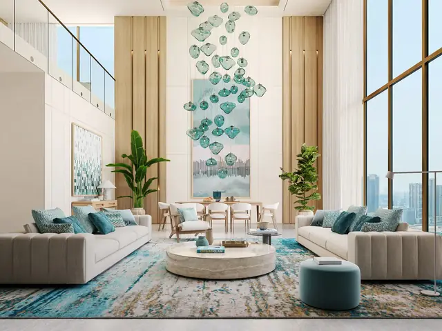 Double-height living room in sea-glass tones