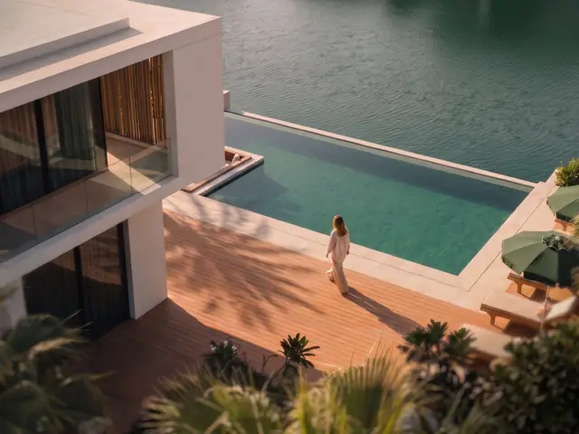 Villa pool deck over the canal at golden hour